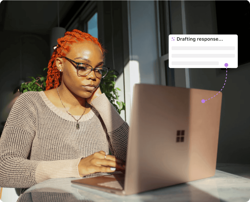Woman Drafting AI Recruiting Email Responses